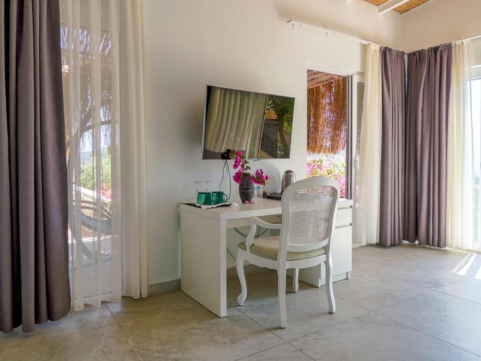 Oza Boutique Hotel Gumusluk Bagian luar foto